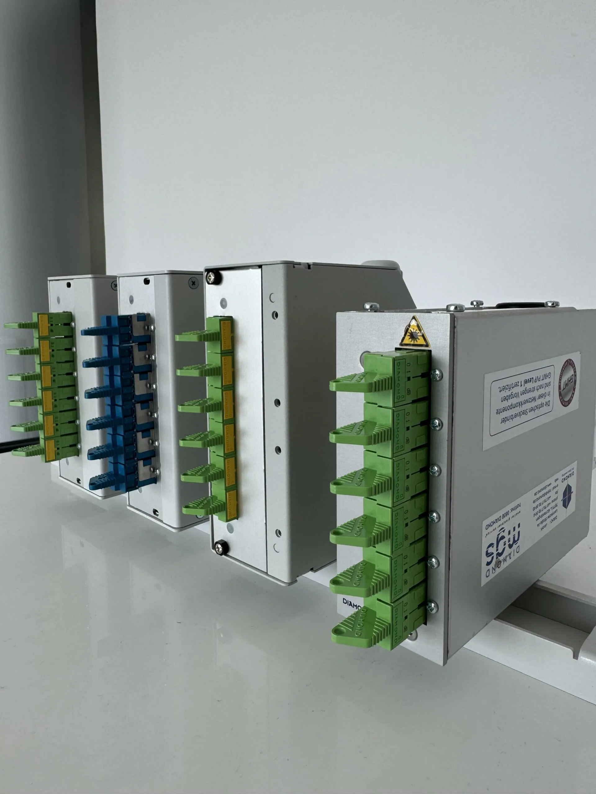 RailConnect 7HP DIN rail box with open lid for easy fiber optic installation
